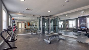 Fitness center with cardio machines and free weights